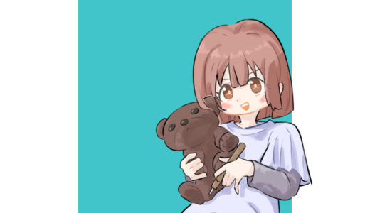 木彫りクマを持ってる女の子